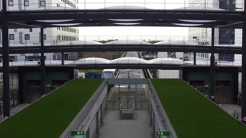 A shuttle train approaching the inter-terminal transit station at Gatwick North Terminal