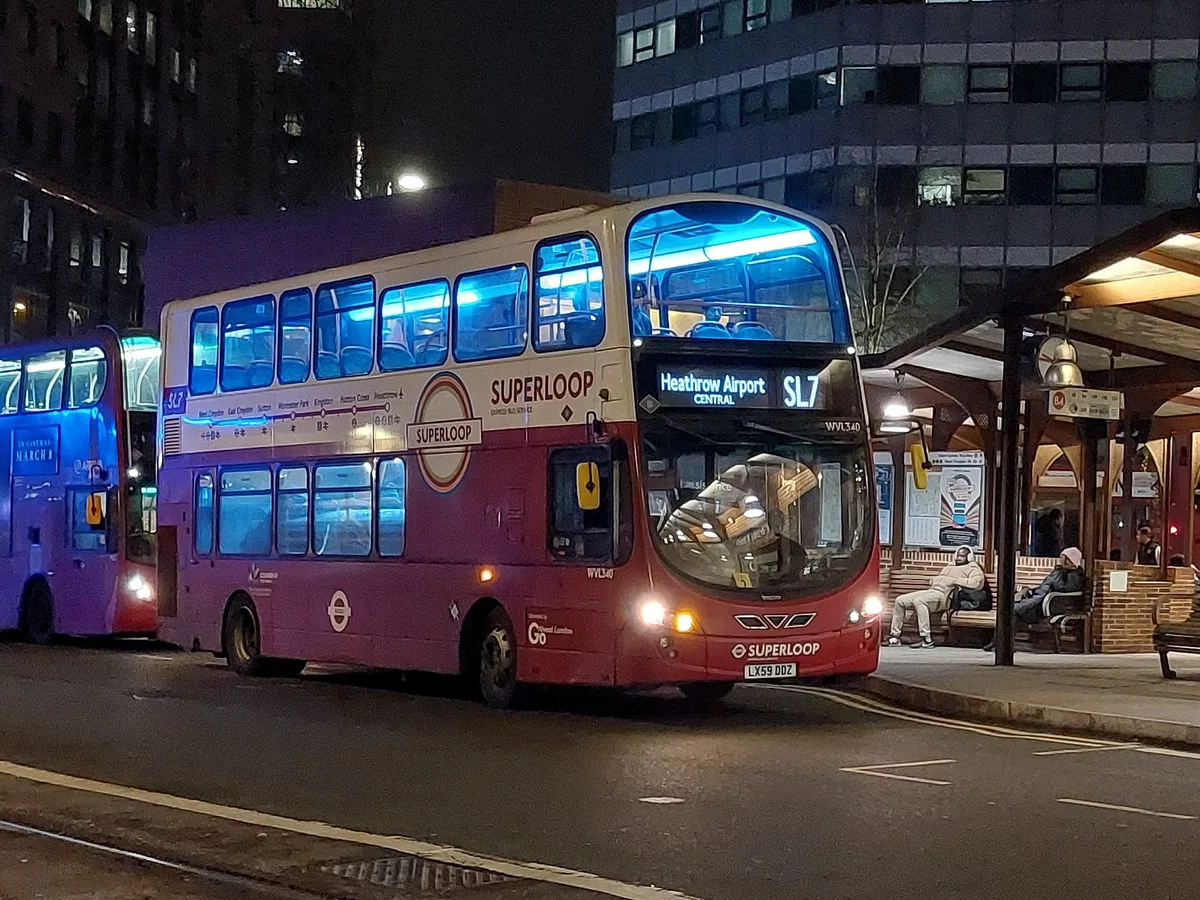 Superloop SL7 double-decker bound for Heathrow Airport at West Croydon bus station at night