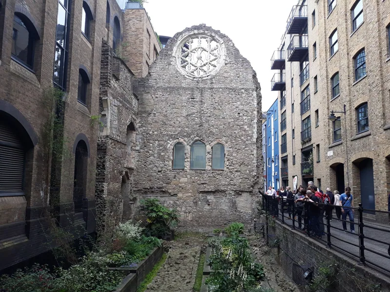 The ruined gable and rose window of Winchester Palace on Clink Street in Southwark