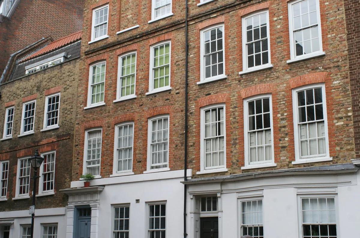 The Georgian brick terrace at 17-21 Folgate Street in Spitalfields, where Dennis Severs' House stands