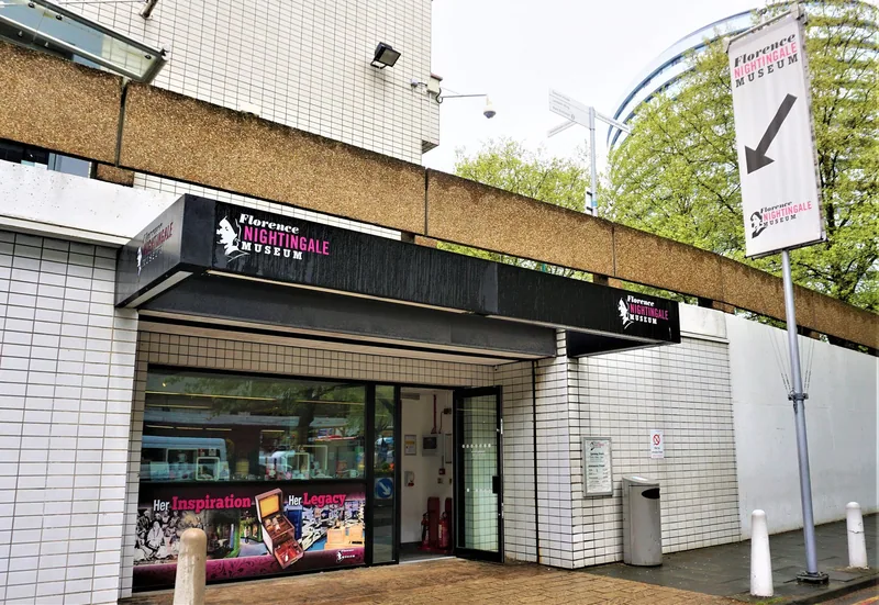 The street entrance to the Florence Nightingale Museum with its name sign above the doors