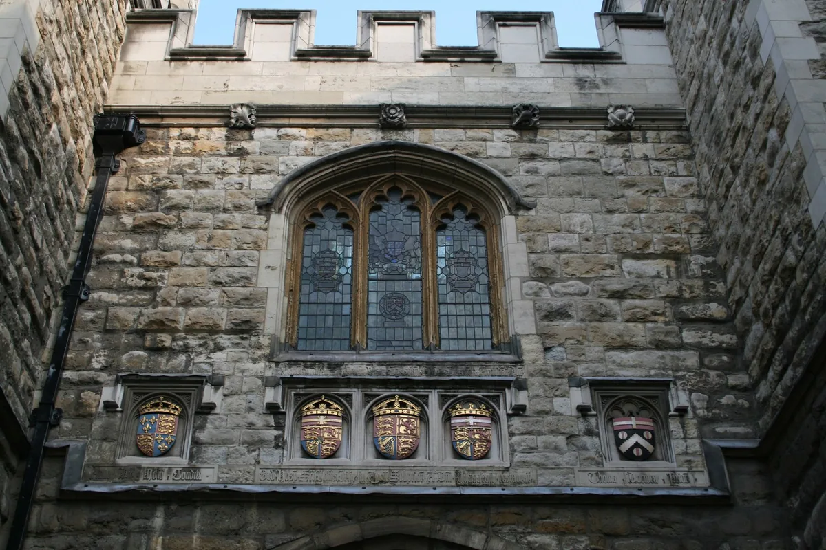 The south front of St John's Gate in Clerkenwell, with its oriel window, painted coats of arms and battlements