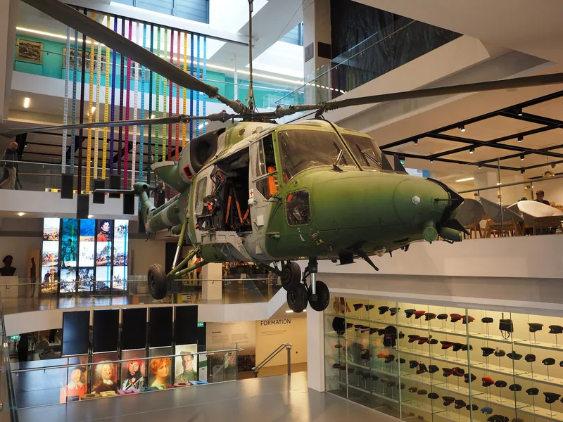 A former British Army Lynx helicopter suspended in the atrium of the National Army Museum