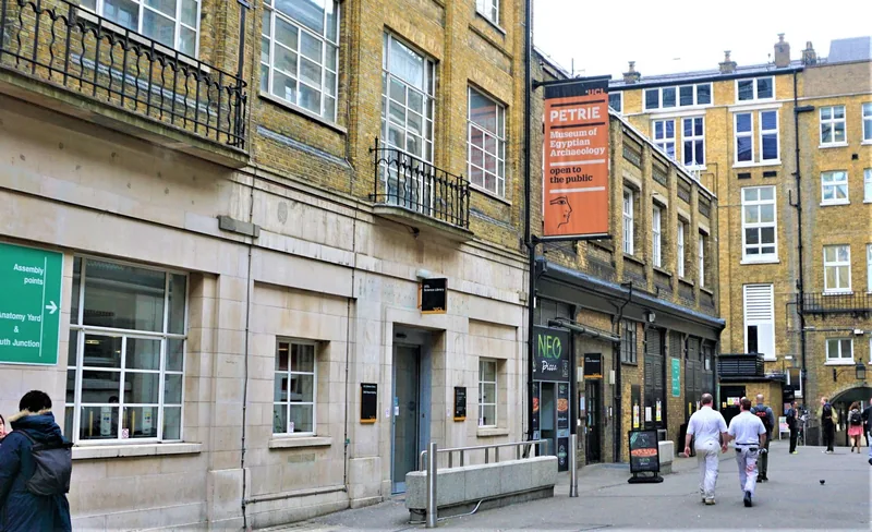 Orange banner for the Petrie Museum of Egyptian Archaeology on the UCL building in Malet Place