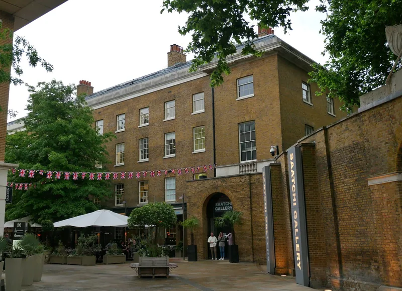 The archway entrance to the Saatchi Gallery in the courtyard of the Duke of York's Headquarters