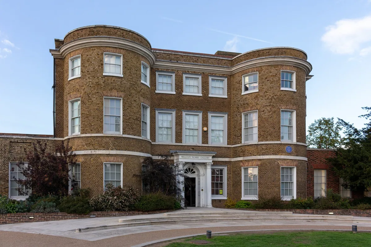 The Georgian brick front of the William Morris Gallery in Walthamstow, seen from its garden