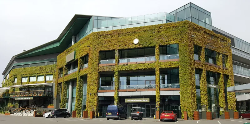 The ivy-clad exterior of the Centre Court building at the All England Club, seen from Church Road