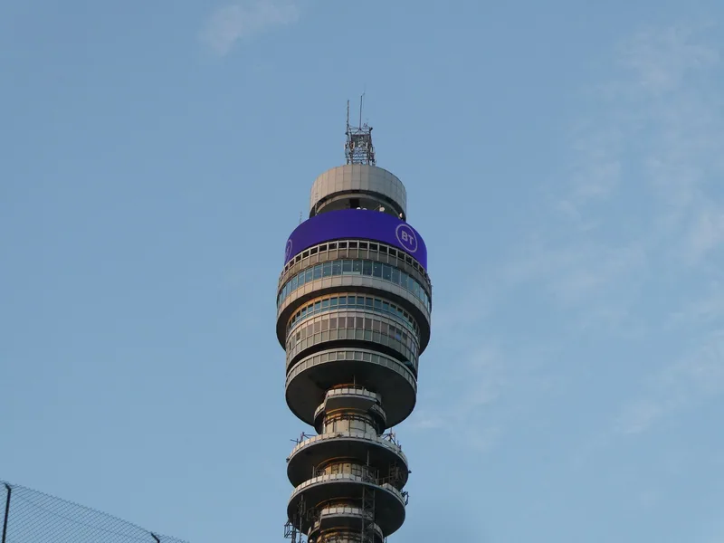 Close view of the BT Tower's crown, with its glazed rings and former revolving restaurant floor