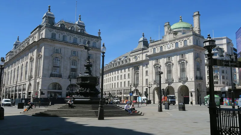 The Shaftesbury Memorial Fountain with its Eros statue and the grand stone buildings of Piccadilly Circus