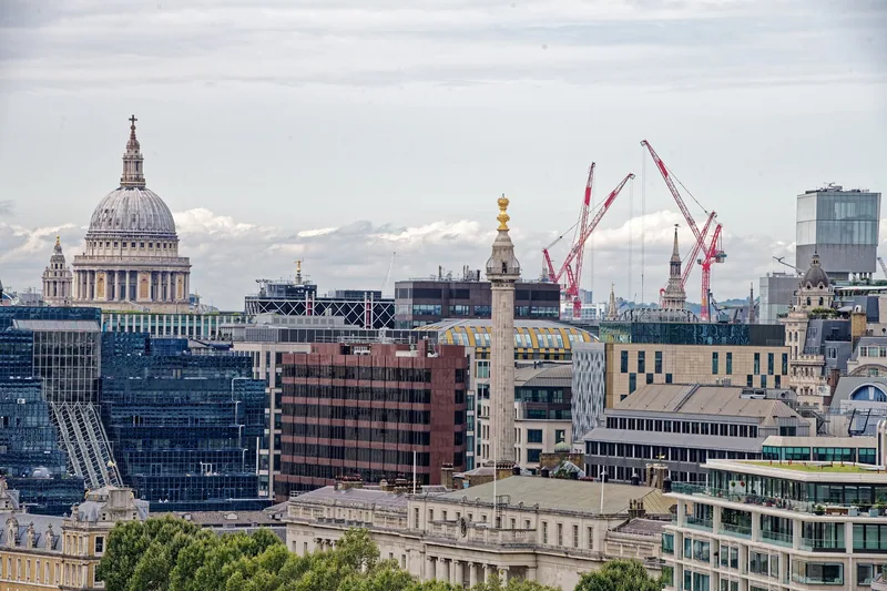 The view from the top of the Monument across City rooftops towards the dome of St Paul's Cathedral