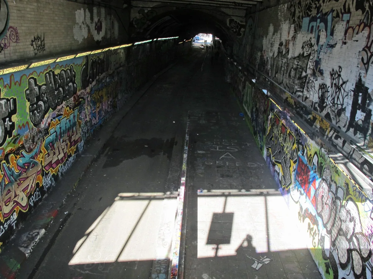 Spray-painted walls running the length of the Leake Street tunnel under Waterloo station
