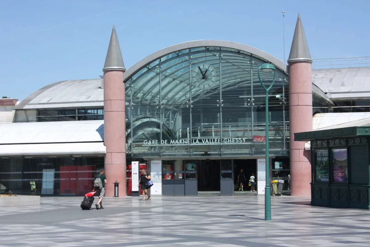 The glass-roofed entrance of Marne-la-Vallée - Chessy station, the stop for Disneyland Paris