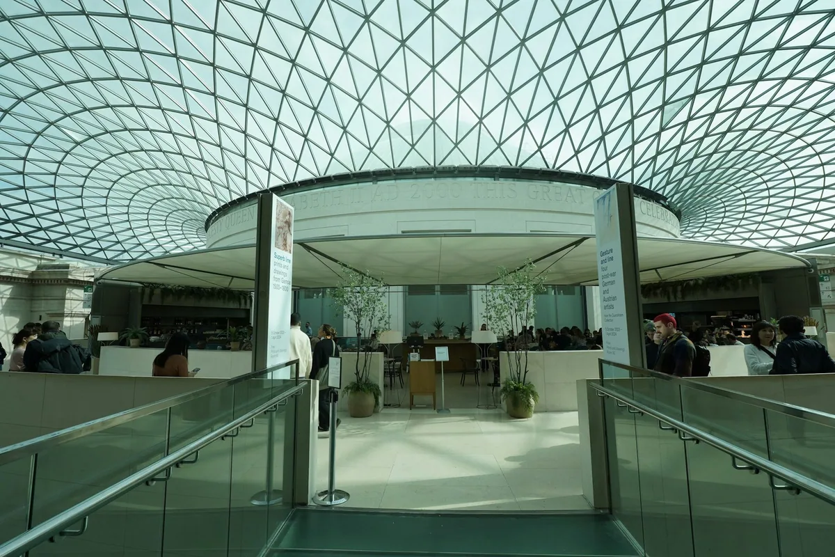 The Great Court Restaurant under the glass roof of the British Museum, beside the Reading Room drum