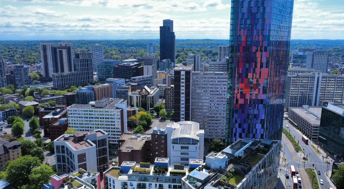 Croydon town centre from the air, with the coloured glass tower of Saffron Square