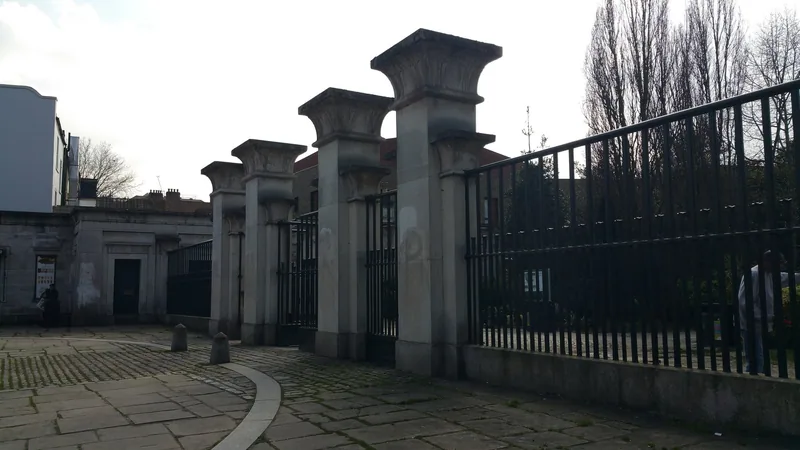 Egyptian-style stone pillars at an entrance to Abney Park Cemetery in Stoke Newington