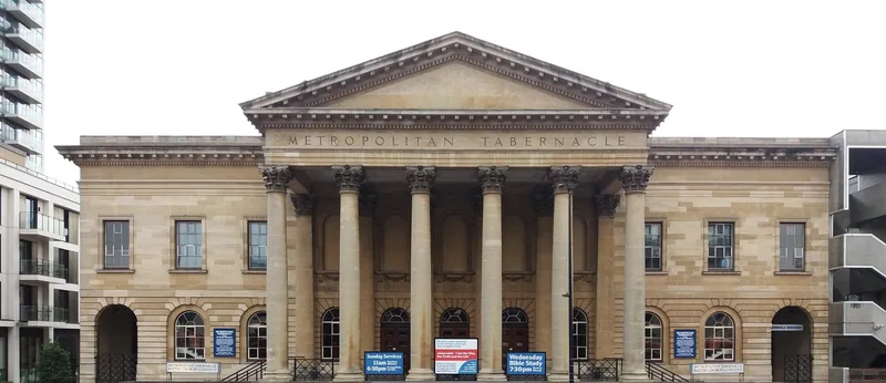 The columned stone portico of the Metropolitan Tabernacle Baptist church