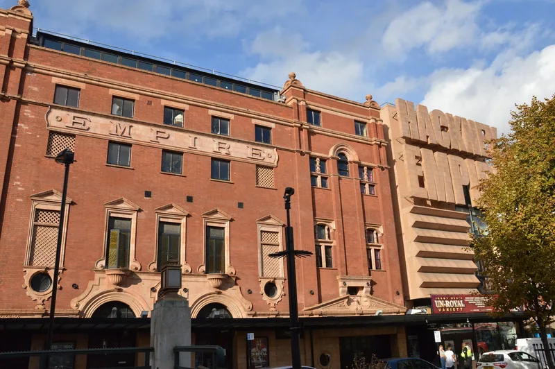 The red brick front of the Hackney Empire theatre on Mare Street, with its EMPIRE lettering above the entrance