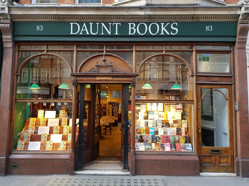 Green Edwardian shopfront of Daunt Books at 83 Marylebone High Street
