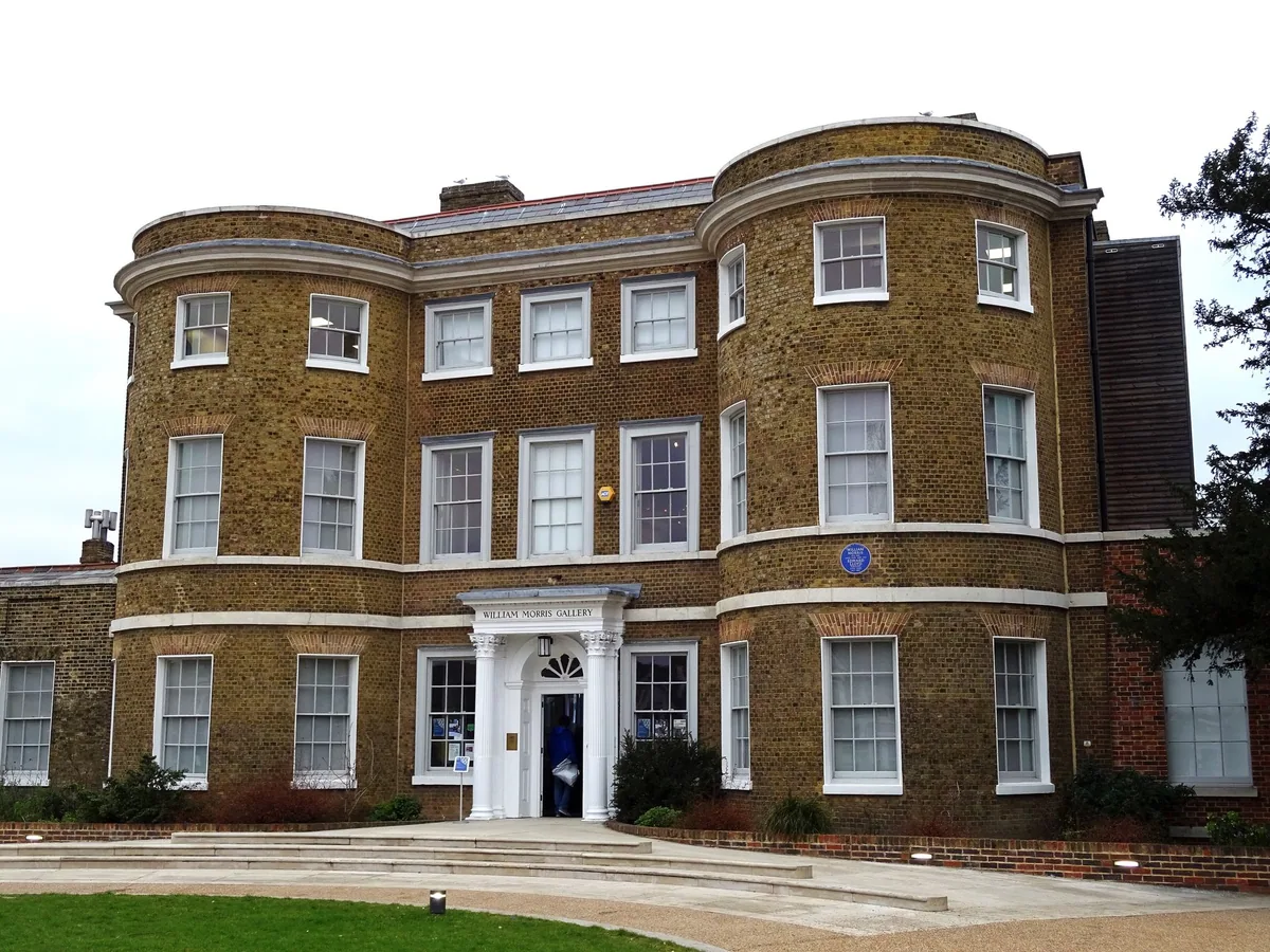 The Georgian brick front of the William Morris Gallery on Forest Road in Walthamstow, seen from its lawn