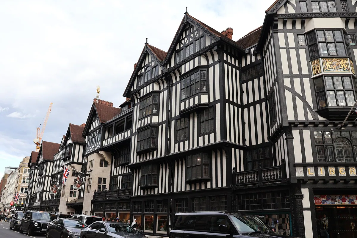 The mock-Tudor timbered facade of the Liberty department store seen from the street