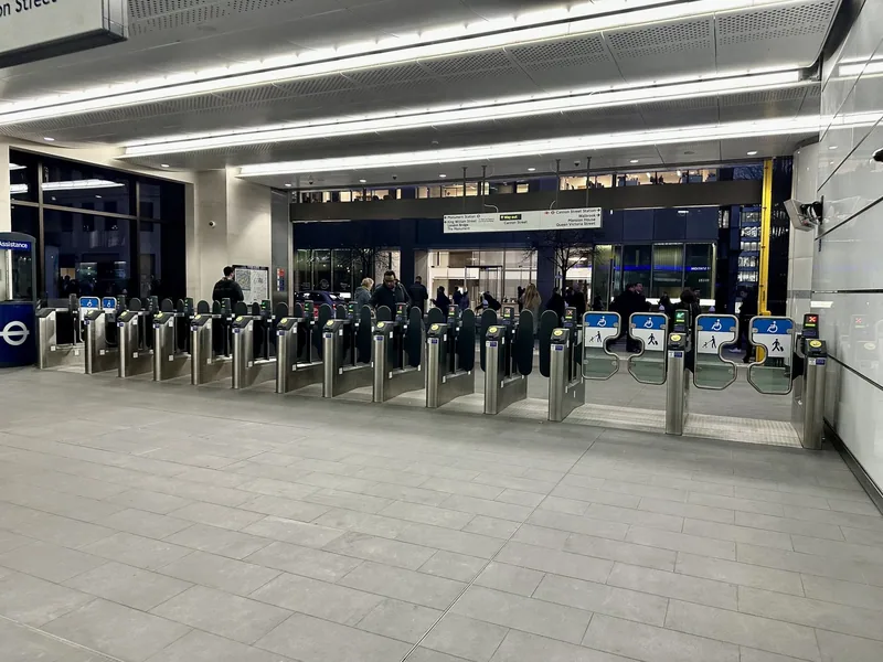 A long line of Oyster gates inside the Cannon Street entrance to Bank station