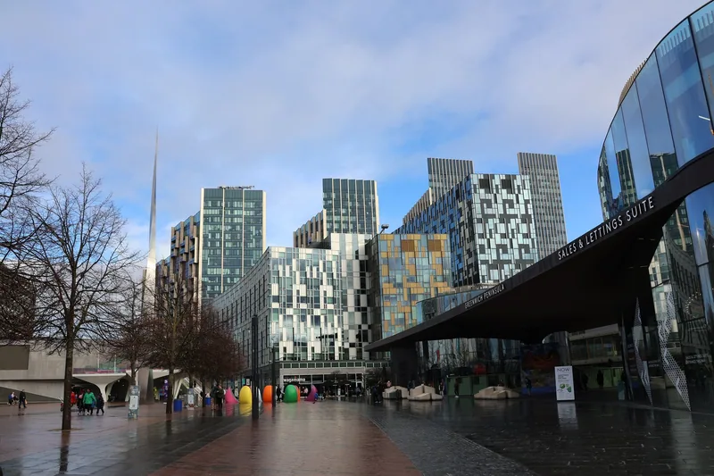 Glass and patterned-panel apartment towers on Greenwich Peninsula, a few minutes' walk from the O2